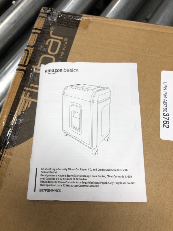 Photo 4 of Amazon Basics 12-Sheet High-Security Micro-Cut Paper, CD, and Credit Card Shredder with Pullout Basket 12 Sheet (original model) Shredder