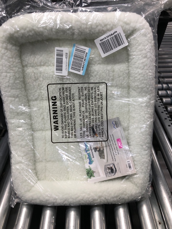 Photo 1 of 24L-Inch White Fleece Dog Bed or Cat Bed w/ Comfortable Bolster, Ideal for Small Dog Breeds & Fits a 24-Inch Dog Crate, Easy Maintenance Machine Wash & Dry, 1-Year Warranty White Fleece 24-Inch