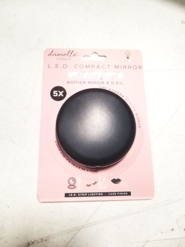 Photo 1 of  COMPACT MIRROR 1X MAG AND 5X MAG BUILT IN LED LIGHT NEW $8.99