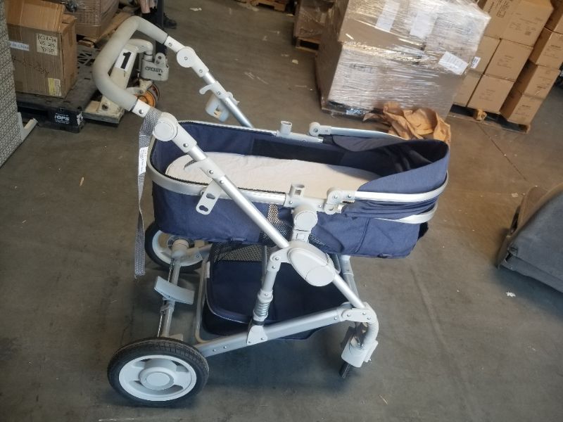 Photo 1 of 3 PIECE STROLLER 1 BABY BED 1 CARSEAT AND 1 STROLLER WITH STORAGE COMPARTMENT BED AND CARSEAT ARE INTERCHANGEABLE 