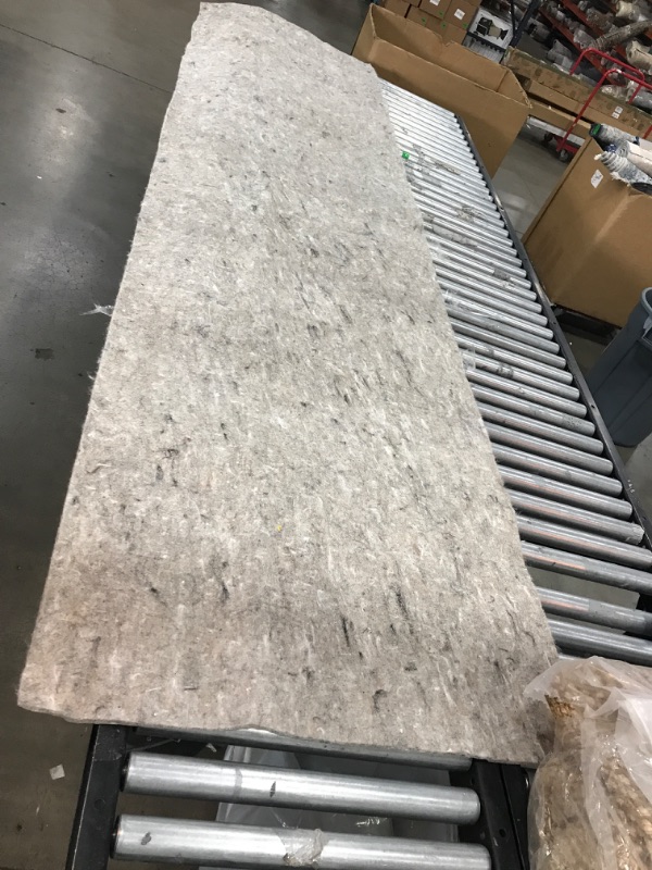 Photo 1 of 11'10" x 3' carpet padding 