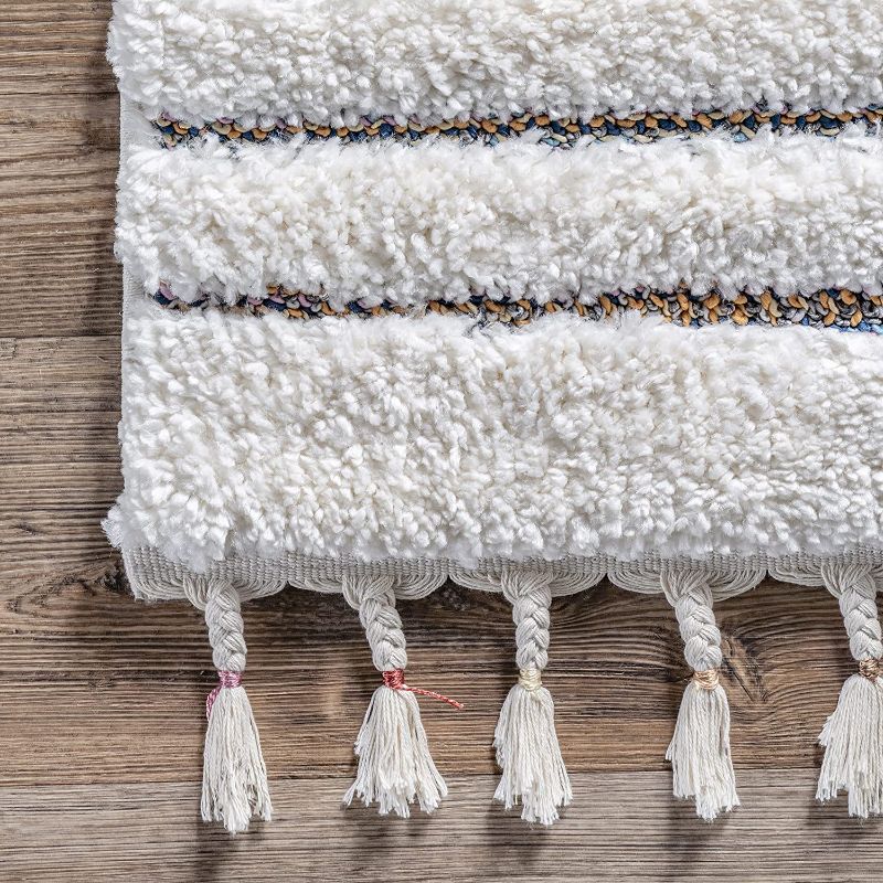 Photo 2 of nuLOOM Angela High-Low Modern Diamond Tassel Area Rug, 6' 7" x 9', Beige 6' 7" x 9' Beige