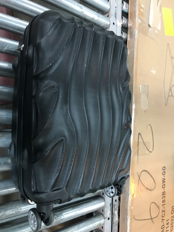 Photo 2 of **DAMAGED** Rockland Melbourne Hardside Expandable Spinner Wheel Luggage, Black Wave, Carry-On 20-Inch Carry-On 20-Inch Black Wave