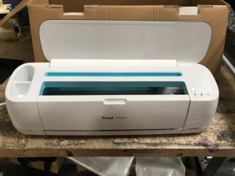 Photo 2 of CRICUT MAKER - SMART CUTTING MACHINE - WITH 10X CUTTING FORCE, CUTS 300+ MATERIALS, CREATE 3D ART, HOME DECOR & MORE, BLUETOOTH CONNECTIVITY, COMPATIBLE WITH IOS, ANDROID, WINDOWS & MAC, BLUE BLUE MAKER
