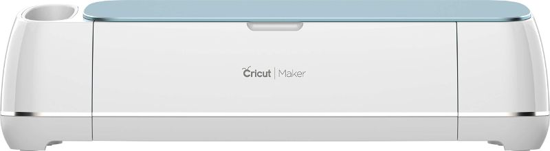 Photo 1 of CRICUT MAKER - SMART CUTTING MACHINE - WITH 10X CUTTING FORCE, CUTS 300+ MATERIALS, CREATE 3D ART, HOME DECOR & MORE, BLUETOOTH CONNECTIVITY, COMPATIBLE WITH IOS, ANDROID, WINDOWS & MAC, BLUE BLUE MAKER
