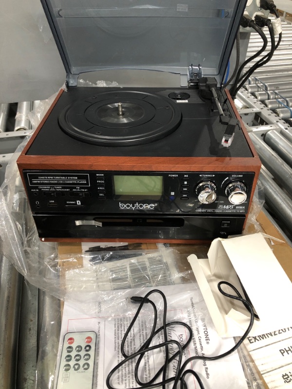 Photo 1 of Boytone BT-22MS, Bluetooth Record Player Turntable, AM/FM Radio, Cassette, CD Player, 2 Built in Speaker, Ability to Convert Vinyl, Radio, Cassette, CD to MP3 Without a Computer, SD Slot, USB, AUX