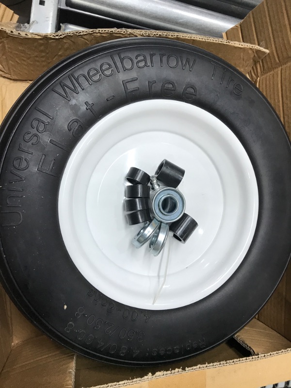 Photo 2 of Flat Free Wheelbarrow Tire 14.5" Universal Fit Air Less Tires 4.80 4.00-8 5/8 Bearing 3" Centered hub Foamed Polyurethane Tire for Garden Outdoor Cart Wagon Lawn Mower Ribbed Tread Axle hole 16mm 2PC