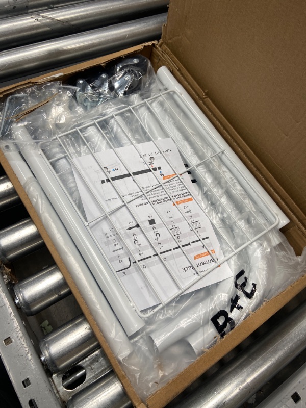 Photo 1 of Sywhitta Clothes Rack on wheels, Clothing Rack with Bottom Mesh Storage Shelf,Sturdy Metal Frame,Rolling Garment Rack for Hanging Clothes,Coats,Skirts,39.76" L x 16" W x 64.56" H,White