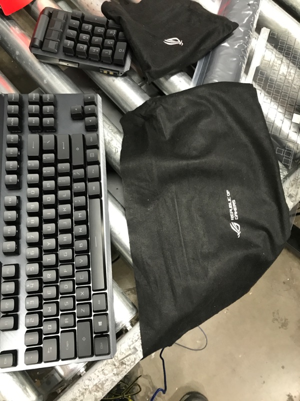 Photo 4 of ASUS ROG Claymore II Wireless Modular Gaming Mechanical Keyboard & ROG Balteus Qi Vertical Gaming Mouse Pad with Wireless Qi Charging Zone, Hard Micro-Textured Gaming Surface (12.6” X 14.6”) ROG Claymore II (RX Blue Switches) Keyboard + Mouse Pad