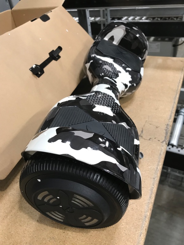 Photo 4 of **DOES NOT FUNCTION**Hover-1 Helix Electric Hoverboard | 7MPH Top Speed, 4 Mile Range, 6HR Full-Charge, Built-in Bluetooth Speaker, Rider Modes: Beginner to Expert Hoverboard Camo