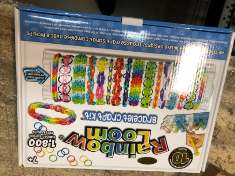 Photo 2 of *** NEW *** Rainbow Loom® Bracelet Craft Kit Features Carrying Case, 8 Bracelet Instructions, Display Rack, 1800 Colorful Bands, Make Up to 72 Bracelets for Boys and Girls 7+ Deluxe