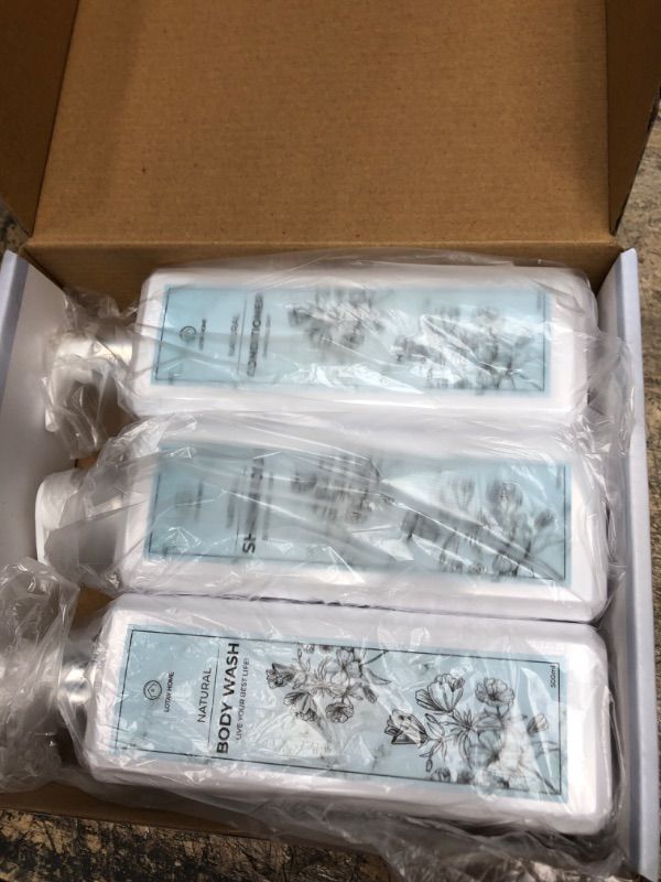 Photo 1 of ***REFILLABLE EMPTY BOTTLES*** Lotay Home Refillable Shampoo and Conditioner Bottles Body Wash Dispenser for Shower Pump Bottle Dispenser Set of 3 White Shampoo Dispenser with blue label
