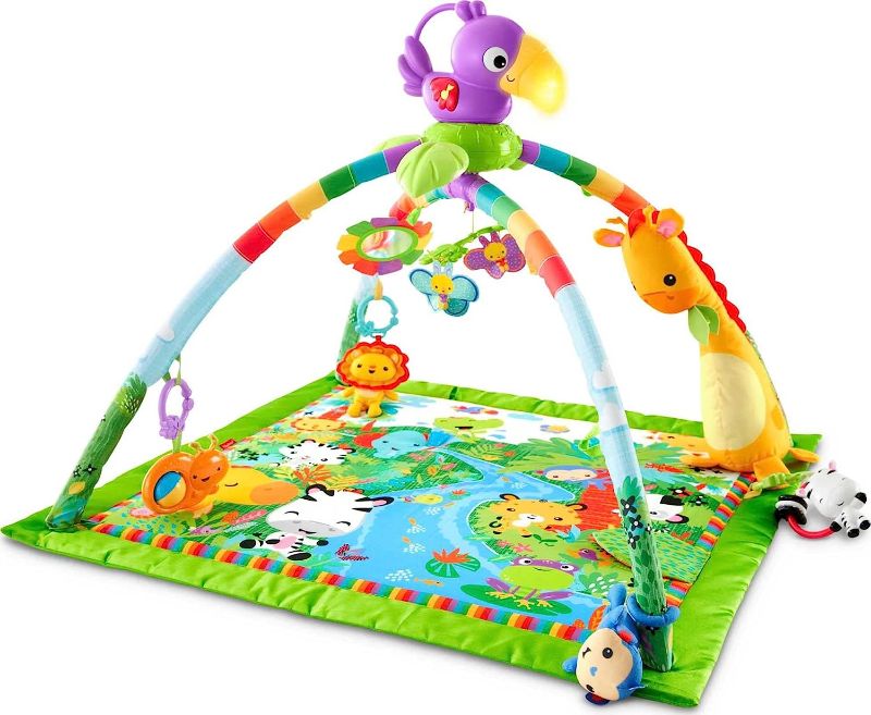 Photo 1 of Fisher-Price Deluxe Kick & Play Piano Gym, Baby Activity Playmat With Toy Piano, Lights, Music And Smart Stages Learning Content For Newborns And Up Kick 'n Play Piano - Frustration Free Packaging