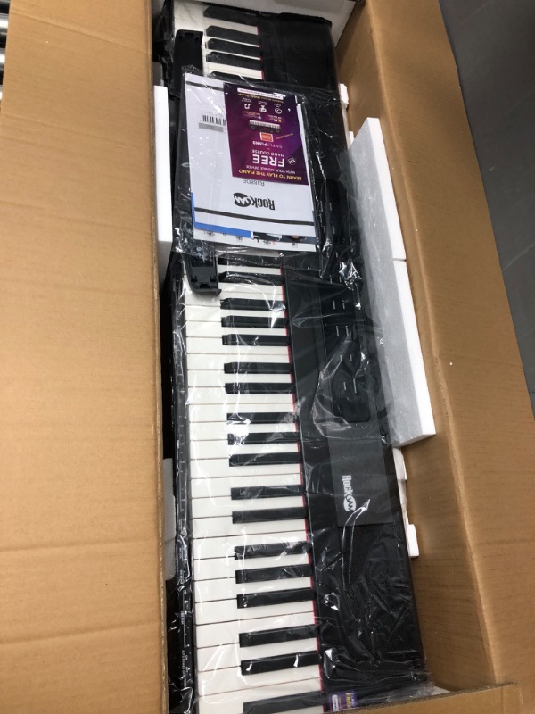 Photo 2 of RockJam 88 Key Digital Piano Keyboard Piano with Full Size Semi-Weighted Keys, Power Supply, Sheet Music Stand, Piano Note Stickers & Simply Piano Lessons
