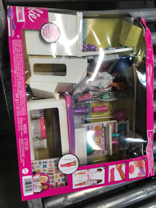 Photo 1 of Barbie Fast Cast Clinic Playset, Brunette Doctor Doll (12-in), 30+ Play Pieces, 4 Play Areas, Cast & Bandage Making, Medical & X-ray Stations, Exam Table, Gift Shop & More, Great Toy Gift