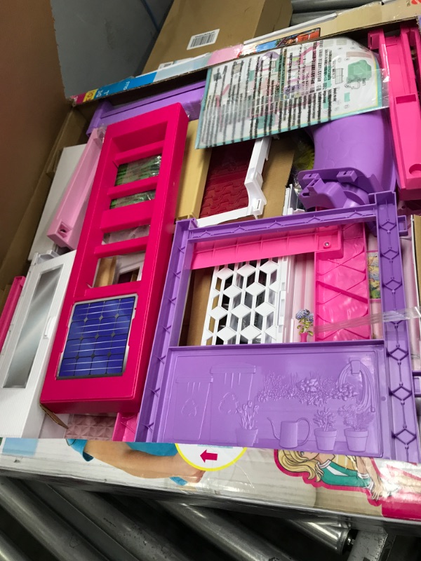 Photo 2 of Barbie Dreamhouse, Doll House Playset with 70+ Accessories Including Transforming Furniture, Elevator, Slide, Lights & Sounds Wheelchair Accessible Elevator