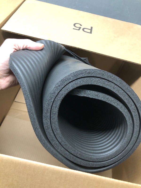 Photo 2 of **FOAM ROLLER NOT INCLUDED**  Amazon Basics Extra Thick Exercise Yoga Gym Floor Mat with Carrying Strap - 74 x 24 x .5 Inches, Black & High-Density Round Foam Roller for Exercise and Recovery - 36 Inch, Black