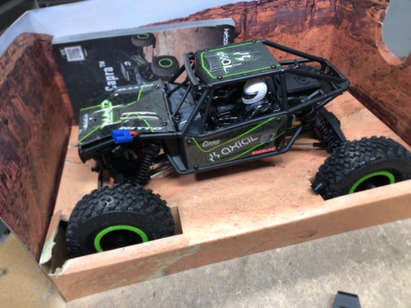 Photo 4 of Axial RC Crawler 1/18 UTB18 Capra 4 Wheel Drive Unlimited Trail Buggy RTR (Battery and Charger Included) Black, AXI01002T1 Black/Green