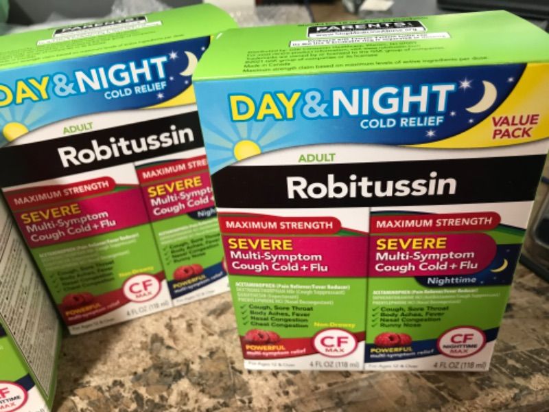 Photo 1 of **EXPIRES 05/2024**  Robitussin Severe Multi-Symptom Cough Cold & Flu Day/Night Value Pack, 4 fl oz, 2 ct
SET OF 2