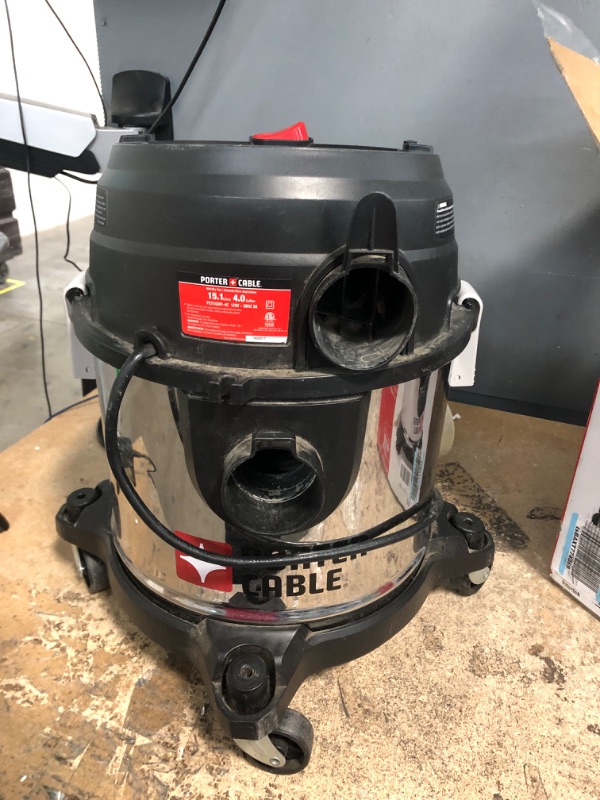 Photo 1 of **SEE NOTES**
PORTER-CABLE Wet/Dry Vacuum 4 Gallon 4HP Stainless Steel Light Weight Portable, Silver+red & Original Manufacturer Filter Bags and Stanley Wet/Dry Vacuum SL18301-3B