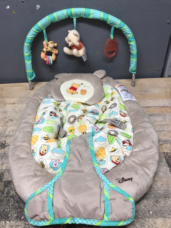 Photo 2 of Bright Starts Disney Winnie the Pooh Winnie the Pooh Dots & Honeypots Bouncer, 0 Months and up (60256) by Kids II