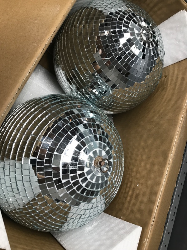 Photo 2 of 2 Pack Large Disco Ball Silver Hanging Mirror Disco Ball Reflective Mirror Disco Ball Ornament for Party Holiday Wedding Dance Music Festivals Decor Club Stage Props DJ Decoration (12 Inch, 12 Inch)