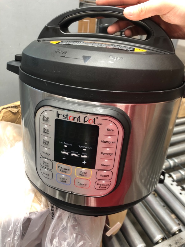 Photo 4 of *A FEW DENTS** Instant Pot Duo 7-in-1 Electric Pressure Cooker, Stainless Steel, 6 Quart Duo Pressure Cooker