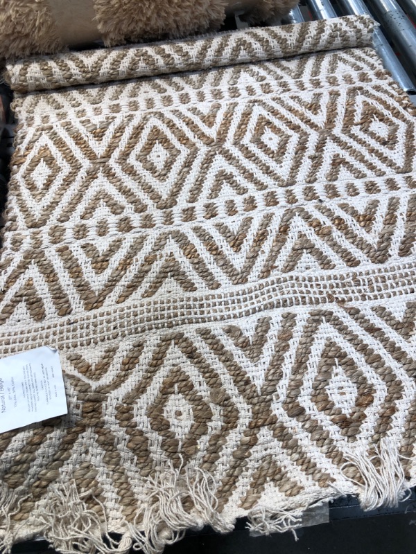 Photo 1 of 23" x 44" woven area rug 