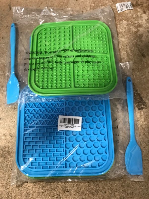 Photo 2 of 2 of- Ertzinla 2 Pcs Lick Mat for Dog and Cat, Dog Slow Feeding Licky Mat for Bathing Grooming Nailing Trimming, Food-Grade Blue & Green