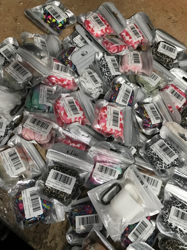 Photo 2 of Bundle of 58 variety airpod sized/printed cases