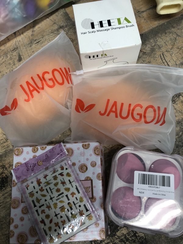 Photo 1 of 6 ITEM ***Gift for My Girl BUNDLE***
6 misc items, scalp massager, make up sponges, nail stickers, jewlelry tray; etc...