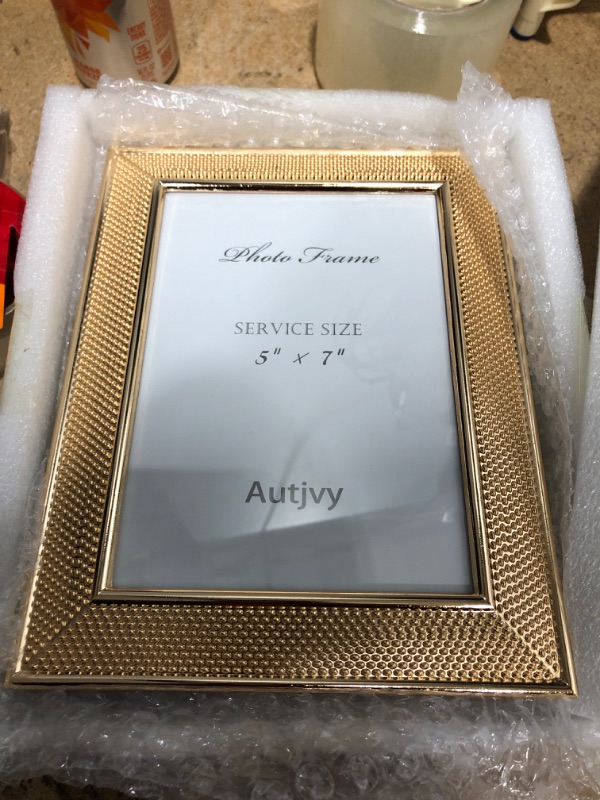 Photo 1 of Autjvy 5x7 Picture Frame, Shiny Gold Aluminum Metal Frame with HD Really Glass, Suitable for Tabletop and Wall Decoration, Fit 5 by 7 photos Gold-2 5x7
