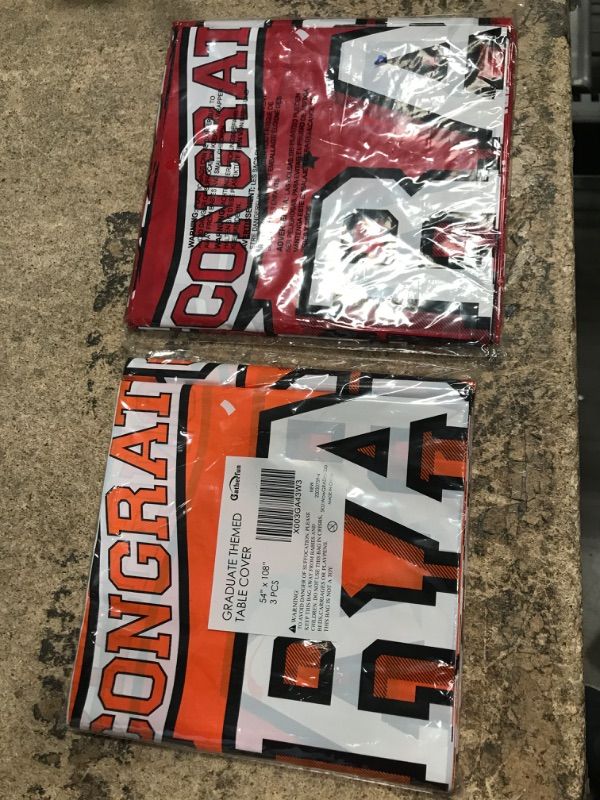 Photo 1 of *NOT GUARANTEED TO BE ORANGE* 2 PACK Gatherfun Graduation Party Supplies,Gongrats Grad Tablecover for 2023 Graduation Party Decorations, 3 pcs Class Orange Table Cloths, 54"x108"
