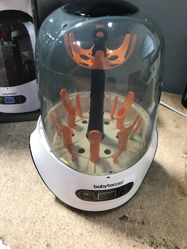 Photo 1 of **DAMAGED** Baby Brezza Baby Bottle Sterilizer and Dryer Machine – Electric Steam Sterilization - Universal Fit - Pacifiers, Glass, Plastic, and Newborn Feeding Bottles