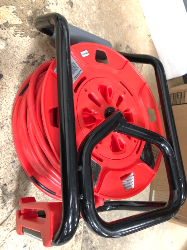 Photo 2 of CRAFTSMAN Retractable Extension Cord Reel 50 Ft. With 4 Outlets & Heavy Duty 14AWG SJTW Cable
