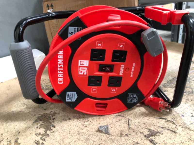 Photo 3 of CRAFTSMAN Retractable Extension Cord Reel 50 Ft. With 4 Outlets & Heavy Duty 14AWG SJTW Cable