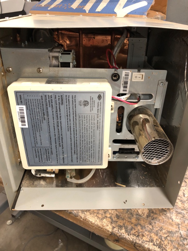 Photo 2 of *UNABLE TO TEST* Girard Tankless RV Water Heater, 12V Power, 42,000 BTUs, Quiet Operation, Onboard Microprocessor, Digital User Control Panel, Freeze Protection, Easy Installation - 2022107534
