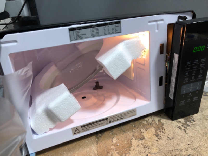 Photo 4 of *MINOR DAMAGE** COMFEE' EM720CPL-PMB Countertop Microwave Oven with Sound On/Off, ECO Mode and Easy One-Touch Buttons, 0.7cu.ft, 700W, Black
