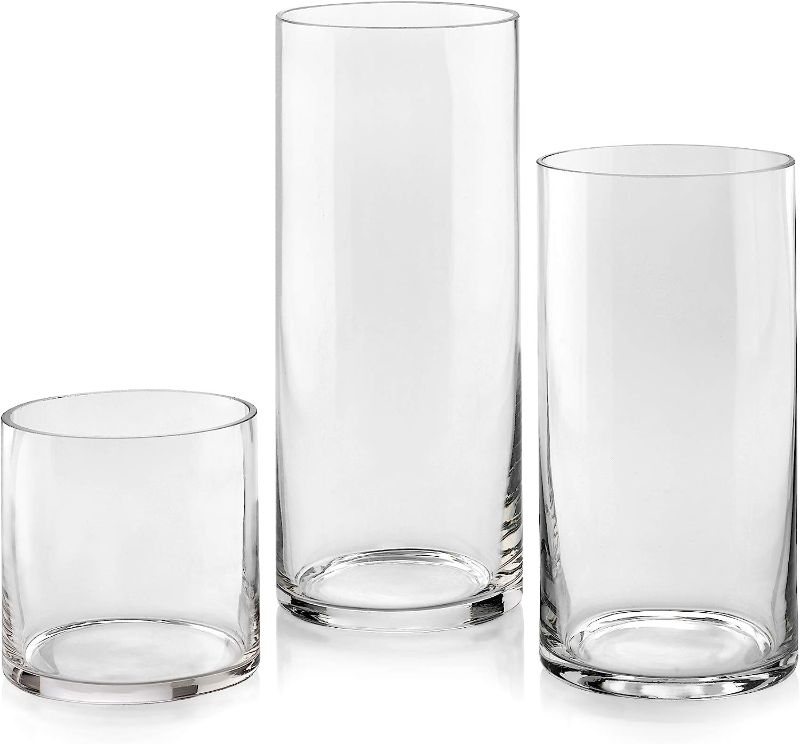 Photo 1 of **BOX OF 12 ** Set of 3 Glass Cylinder Vases 5, 8, 10 Inch Tall – Multi-use: Pillar Candle, Floating Candles Holders or Flower Vase – Perfect as a Wedding Centerpieces.

