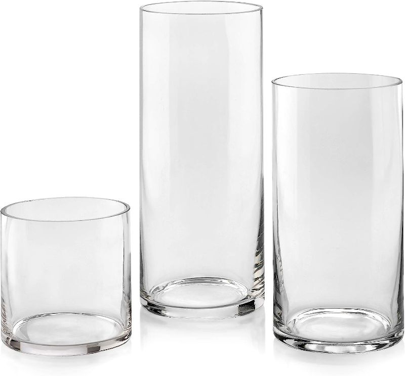 Photo 1 of **SET OF 12 TOTAL** Set of 3 Glass Cylinder Vases 5, 8, 10 Inch Tall – Multi-use: Pillar Candle, Floating Candles Holders or Flower Vase – Perfect as a Wedding Centerpieces.
