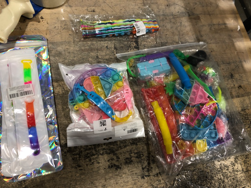 Photo 1 of 4 ITEMS, FIDGET TOYS BUNDLE
