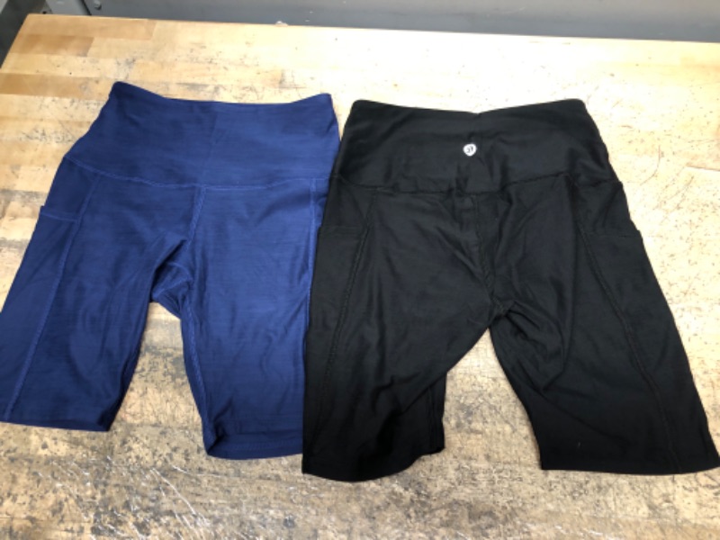 Photo 3 of DEVOPS Women's 2-Pack High Waist Workout Yoga Running Exercise Shorts with Side Pockets, Black & Blue pair. 