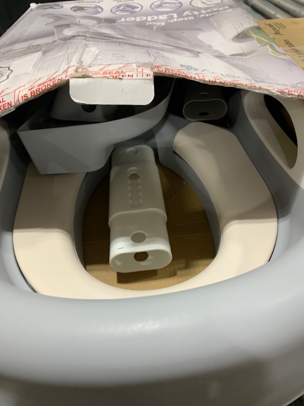 Photo 1 of Potty Training Ladder - Soft Cushioned Seat, Adjustable Height, Collapsible, Non-Slip with Splash Guard - Ready Step Go! - Jool Baby (Gray)
