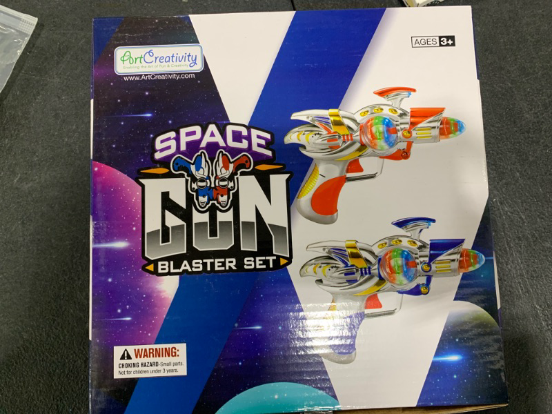 Photo 2 of ArtCreativity Red and Blue Super Spinning Space Blaster Laser Gun Set with Flashing LEDs and Sound Effects - Pack of 2 - Cool Futuristic Toy Guns - Batteries Included - Great Gift Idea for Kids