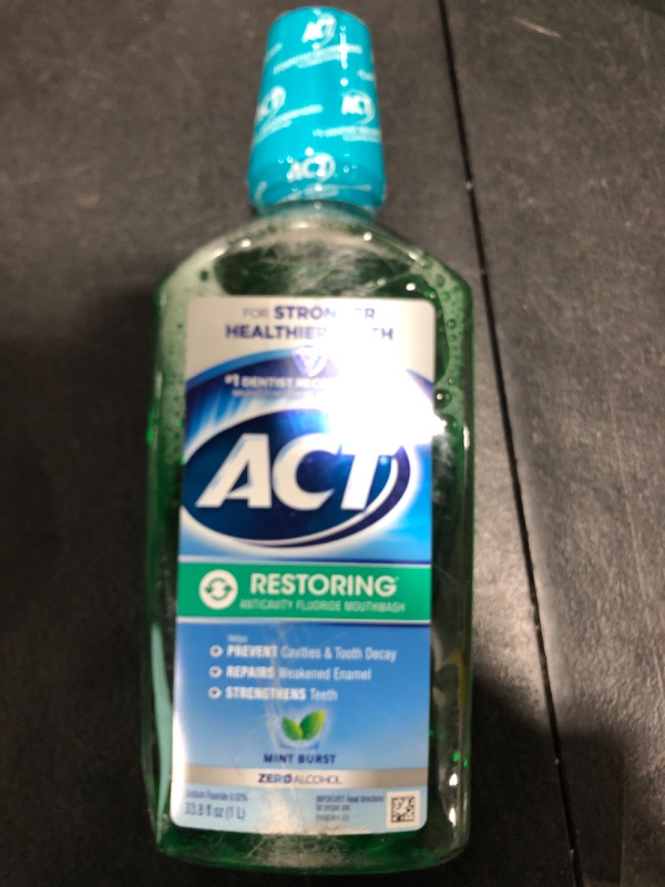 Photo 2 of Act Restoring Mouthwash, Mint Burst - 33.8 fl oz