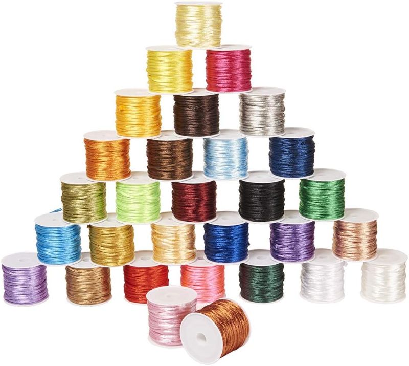 Photo 1 of PH PandaHall 328 Yards 2mm Satin Nylon Trim Cord 328 Yards Rattail Silk Cord Bracelet String Beading String for Necklace Macrame Friendship Bracelet Chinese Knot Dream Catchers Braid Hair
