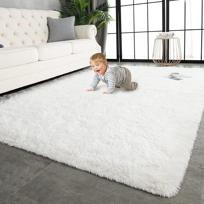 Photo 1 of TWINNIS Super Soft Shaggy Rugs Fluffy Carpets 6x9 Feet, Indoor Modern Plush Area Rugs for Living Room Bedroom Kids Room Nursery Home Decor, Upgrade Anti-Skid Rectangular Fuzzy Rug, Cream White
