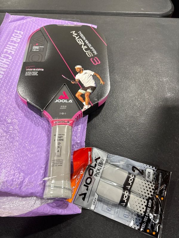 Photo 2 of JOOLA Tyson McGuffin Magnus 3 16mm Pickleball Paddle with 1 Replacement Grip - Elongated Short Handle Pickleball Paddle - Charged Carbon Surface Technology - Carbon Fiber Racket, Hot Pink Edge Guard