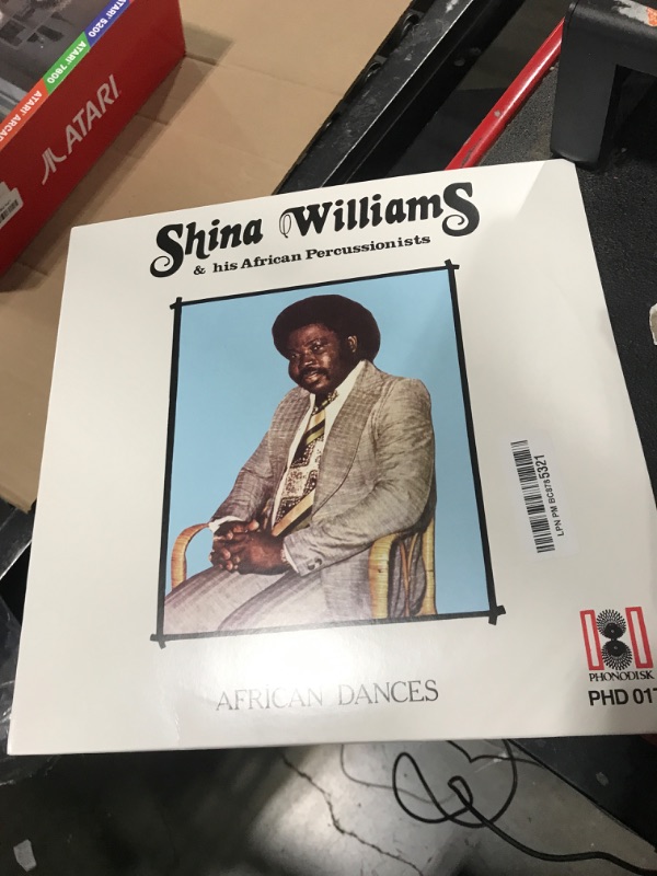 Photo 1 of African Dances SHINA WILLIAMS & HIS AFRICAN PERCUSSIONISTS- Exclusive Transparent Cyan [vinyl] SHINA WILLIAMS & HIS AFRICAN PERCUSSIONISTS
