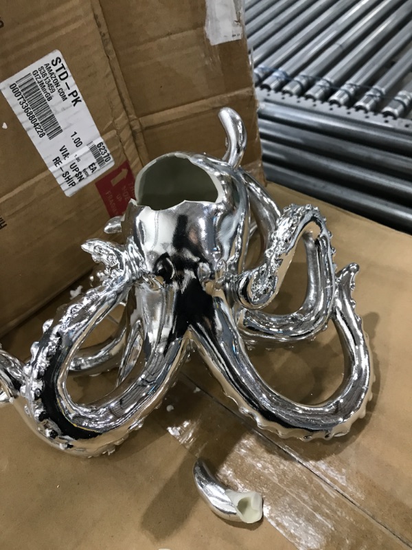 Photo 2 of **damage to head and tentacle tip**
Deco 79 Polystone Octopus Sculpture with Long Tentacles and Suctions Detailing, 12" x 7" x 7", Silver